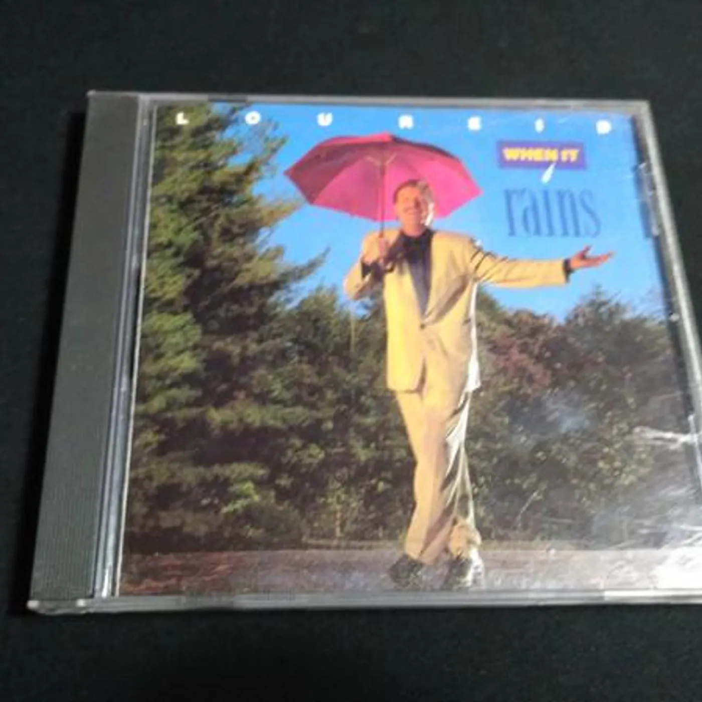 Lou Reid WHEN IT RAINS CD