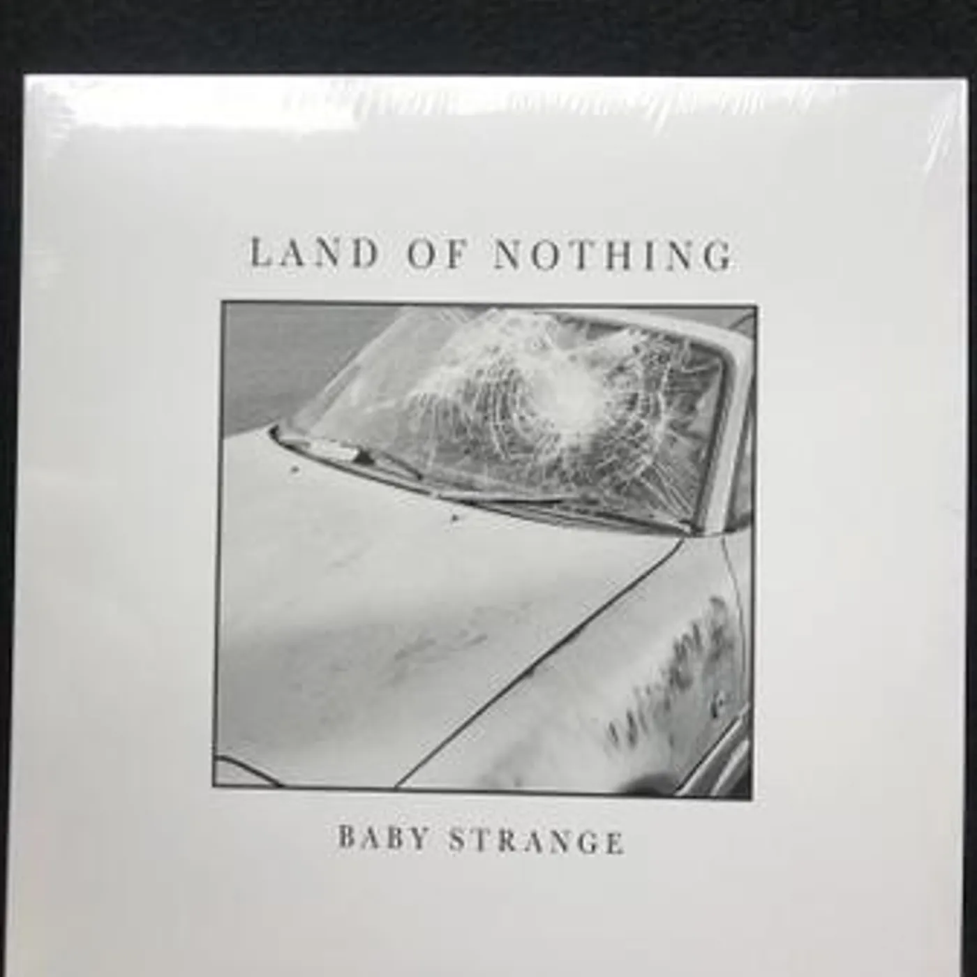 Baby Strange LAND OF NOTHING (WHITE OPAQUE VINYL) (I) Vinyl Record
