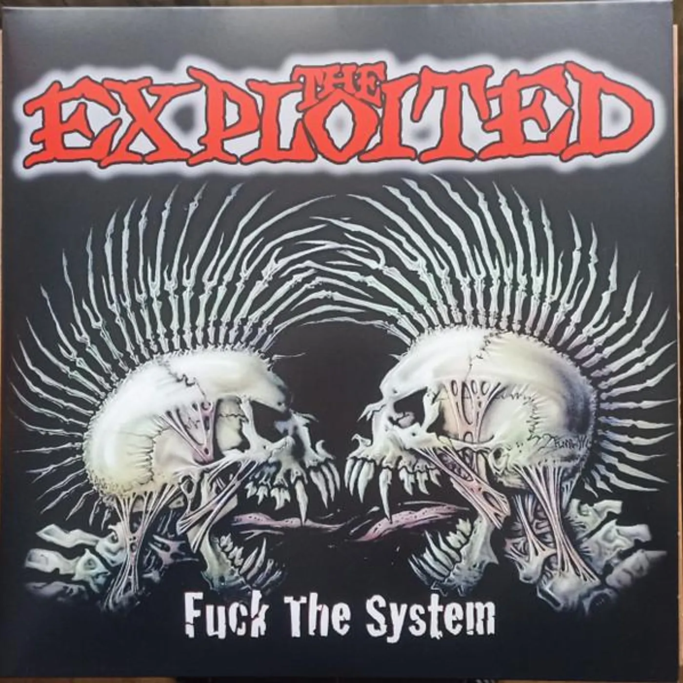 The Exploited Fuck The System (Clear W Red & Black Splatter) Vinyl Record