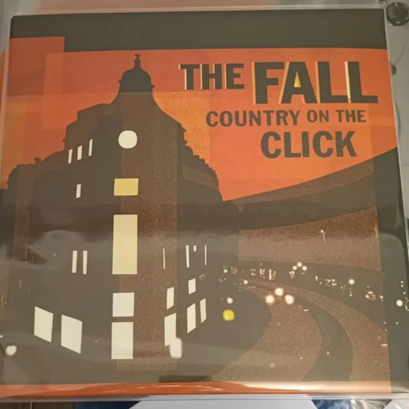 The Fall COUNTRY ON THE CLICK (ALTERNATIVE VERSION) (TRANSLUCENT ORANGE VINYL) Vinyl Record