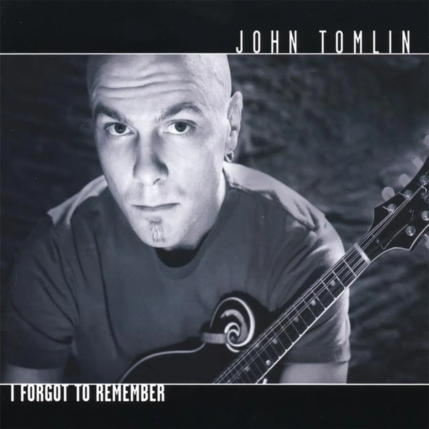 John Tomlin Brand Page