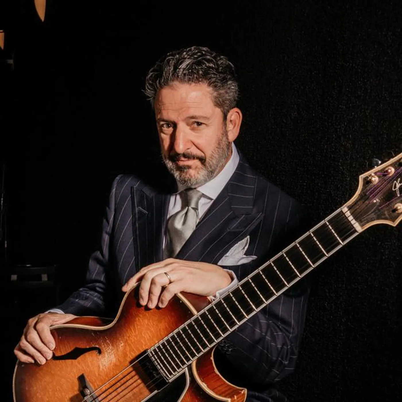 John Pizzarelli Brand Page
