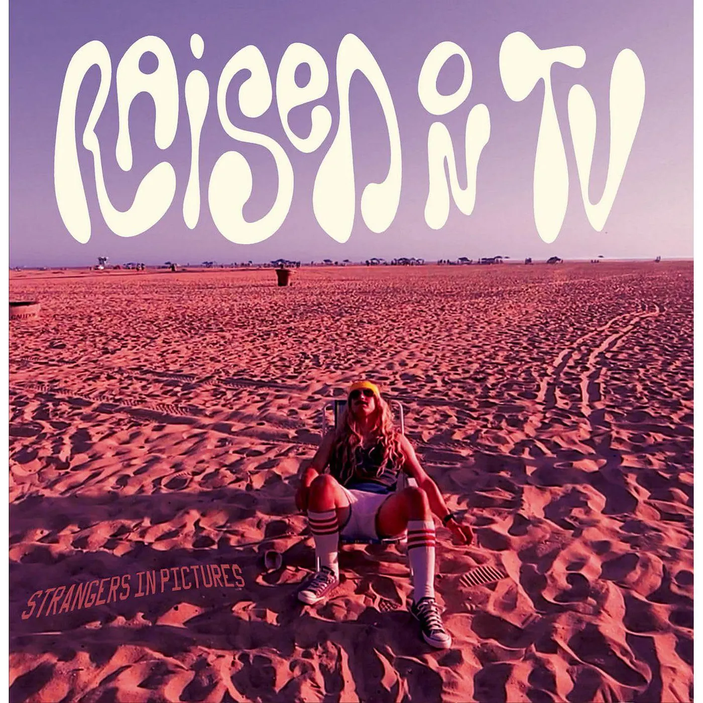 Raised on TV Strangers In Pictures Vinyl Record