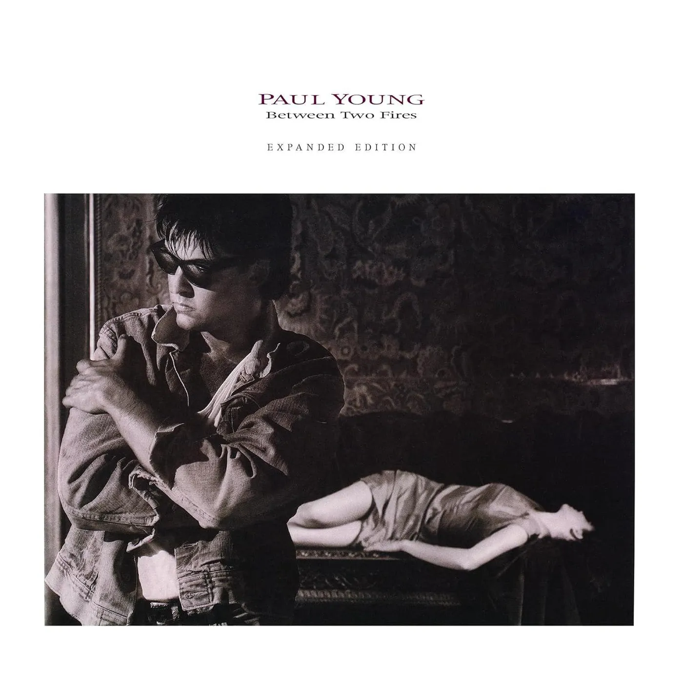 Paul Young Between Two Fires (Limited Edition/ Expanded Version/ 180 Gram/ 2LP/ Orange) Vinyl Record