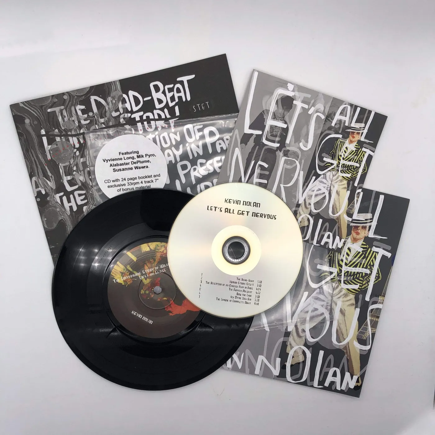 CD + 7" VINYL RECORD Let's All Get Nervous by Kevin Nolan