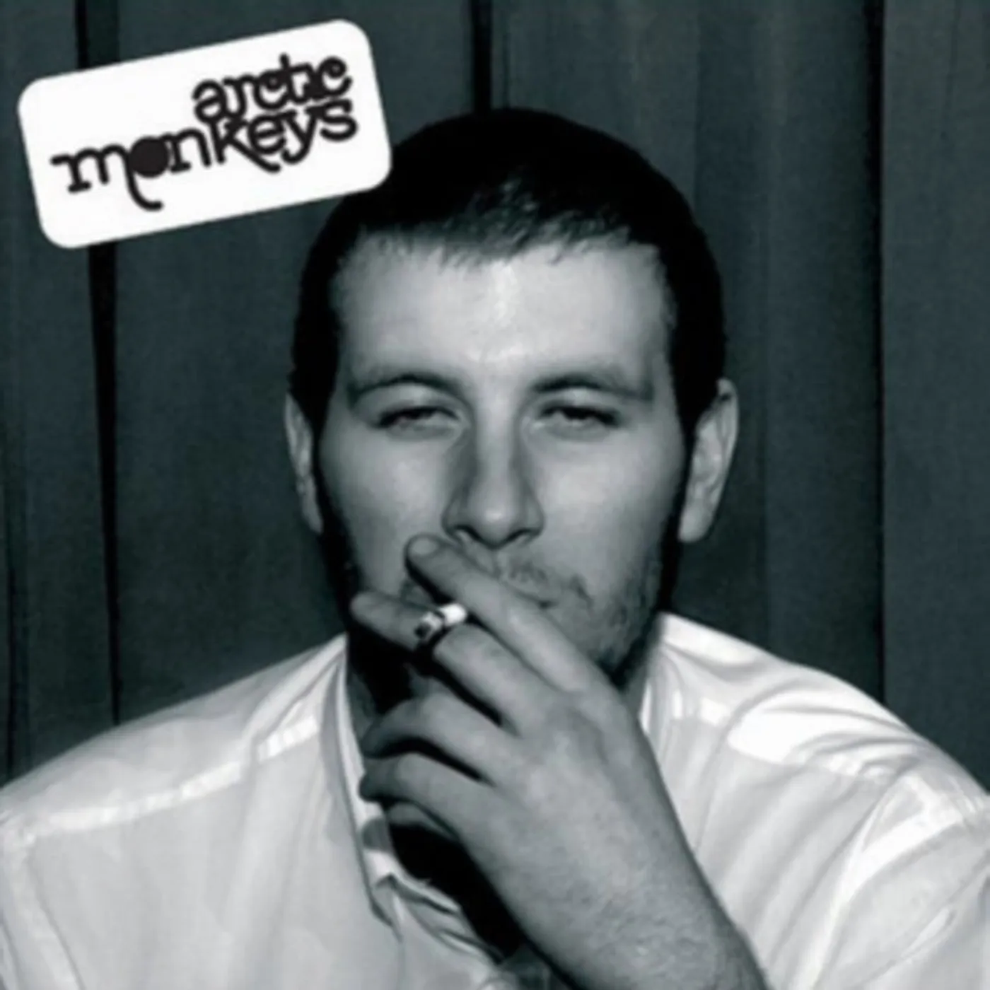 Arctic Monkeys LP Vinyl Record - WhateverPeopleSayIAm, That'sWhatI'm Not