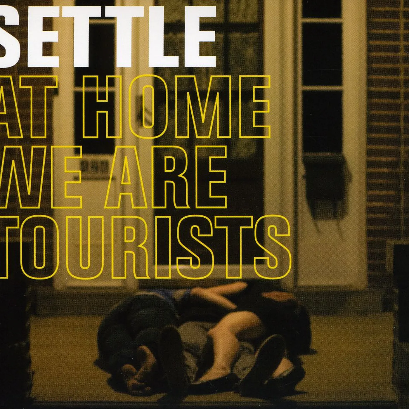 Settle AT HOME WE ARE TOURISTS CD