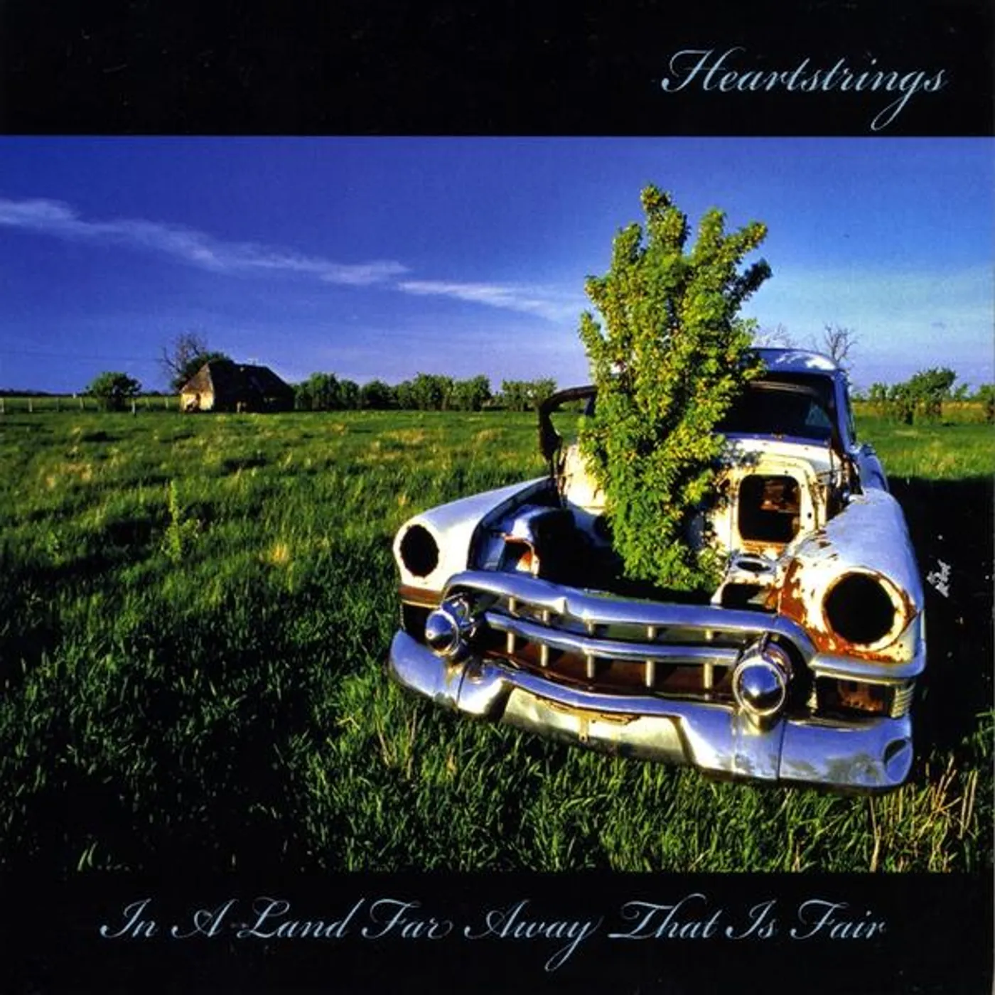 Heartstrings IN A LAND FAR AWAY THAT IS FAIR CD