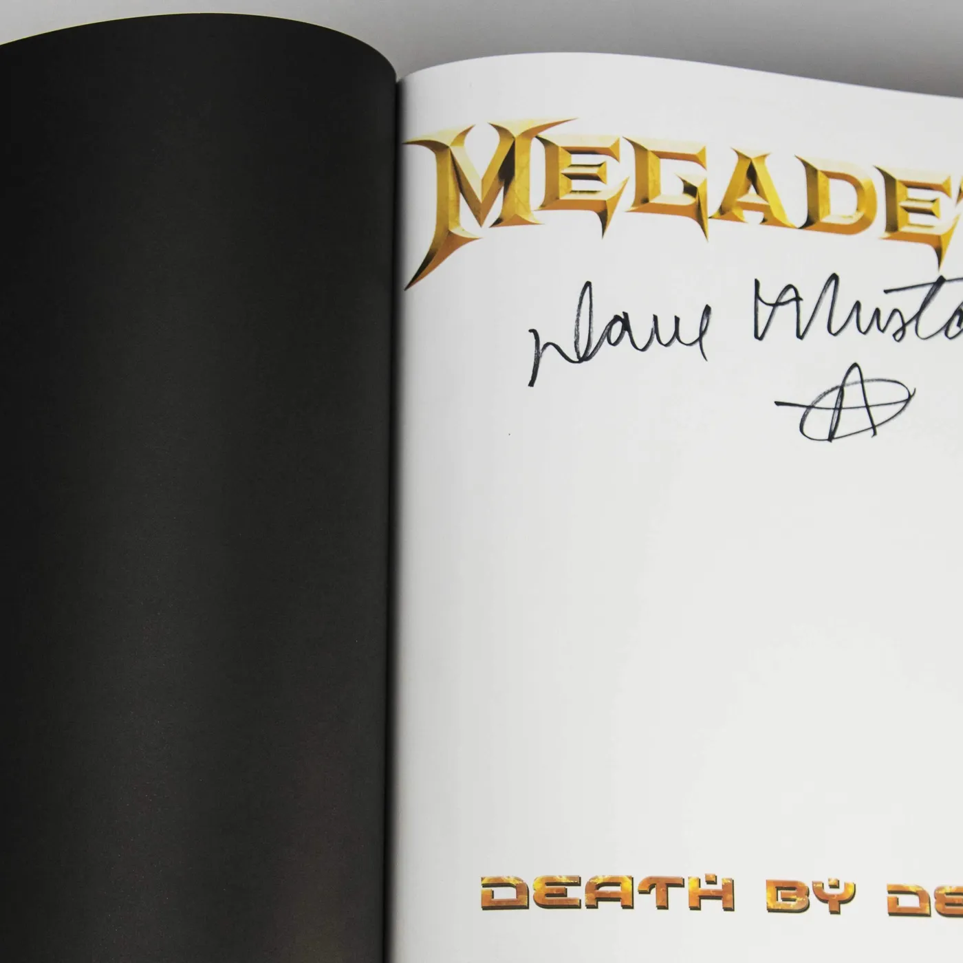 Bandwear Superstore Megadeth: Death By Design w/ 4 clear vinyl "Warheads On Foreheads"” album set signed by Dave Mustaine